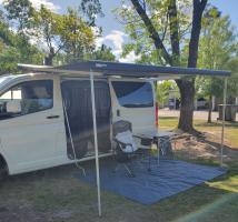 Photo by Kerri From ACT. Nov 2024 - Fiamma F80s Roof-Mount Awning - 3.2m - Deep Black Case / Royal Grey Fabric - 2.5m Projection