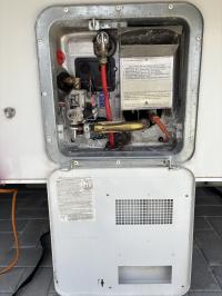 Photo by Andrew From WA. Feb 2025 - Door Hinge - Silver - Suits Suburban SW6 / SW10 Hot Water Systems