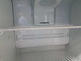 Photo by Sue From WA. I installed it upside down so it had a small barrier to stop anything sliding off. Aug 2025 - Upper Cabinet Shelf - Suits Dometic RUA5208X / RUC5208X / RUA6408X / RUC6408X / RUA8408X / RUC8408X Fridges