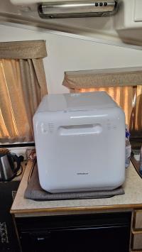 Photo by Peter From NSW. Corelle small dinner plates fit perfectly in and uses 5ltrs of water to clean.. Sep 2025 - Aussie Traveller Portable Benchtop Dishwasher - 3 Place Settings - 5L