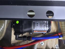 Photo by Rod. I had to adjust the pressure switch right out so that the screw was almost out of thread. Oct 2025 - Flojet Quiet Quad Automatic Water Pump - 12V / 12.5L/min / 35psi