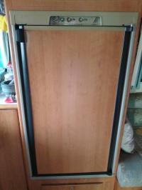Photo by Craig From QLD. The beige top plate is actually the old bottom plate off the original door. Dec 2025 - Fridge Door Only - Black Trim - Suits Dometic RM2553 / RM2555 Fridges