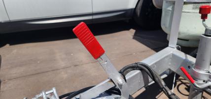 Photo by Richard From SA. Feb 2026 - AL-KO Brake Lever Cover - Red - Suits Lever Arms up to 5mm Thick x 25mm Wide
