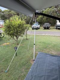 Photo by Eddy From NSW. I have not used the single guy rope supplied as I prefer a double system which is stronger and more stable. Mar 2026 - Aussie Traveller Electric Roll-Out Awning Cradle Support Kit with Poles - White