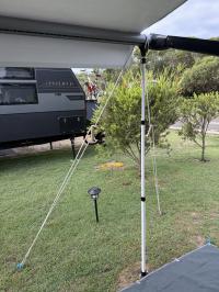 Photo by Eddy From NSW. I have not used the single guy rope supplied as I prefer a double system which is stronger and more stable. Mar 2026 - Aussie Traveller Electric Roll-Out Awning Cradle Support Kit with Poles - White