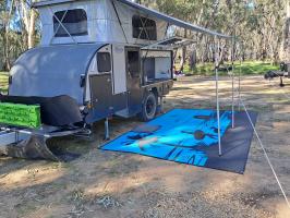 Photo by Brad. Apr 2026 - Affordable Camping Mats Recycled Polypropylene Annex Mat - Morning Surf / Aqua & Black - 4 x 2.4m - Reversible